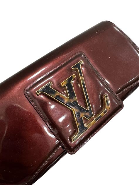 Louis Vuitton Sobe Clutch 